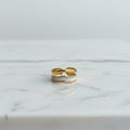 1. Bague doré avec de détails blancs en acier inoxydable