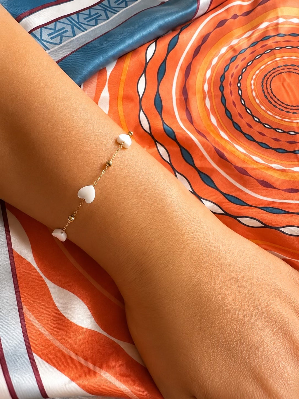 Ensemble collier & bracelet cœurs nacrés dorés